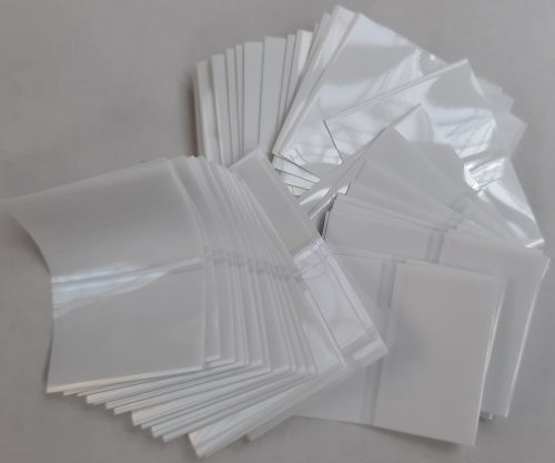 Fehér PVC sleeve-zsugorcímke hosszanti perforációval - darabolt - 55x42mm